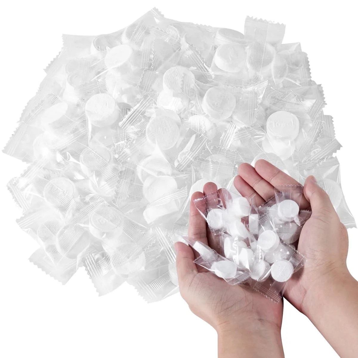 White rectangular box containing 200 compressed polyester towels
