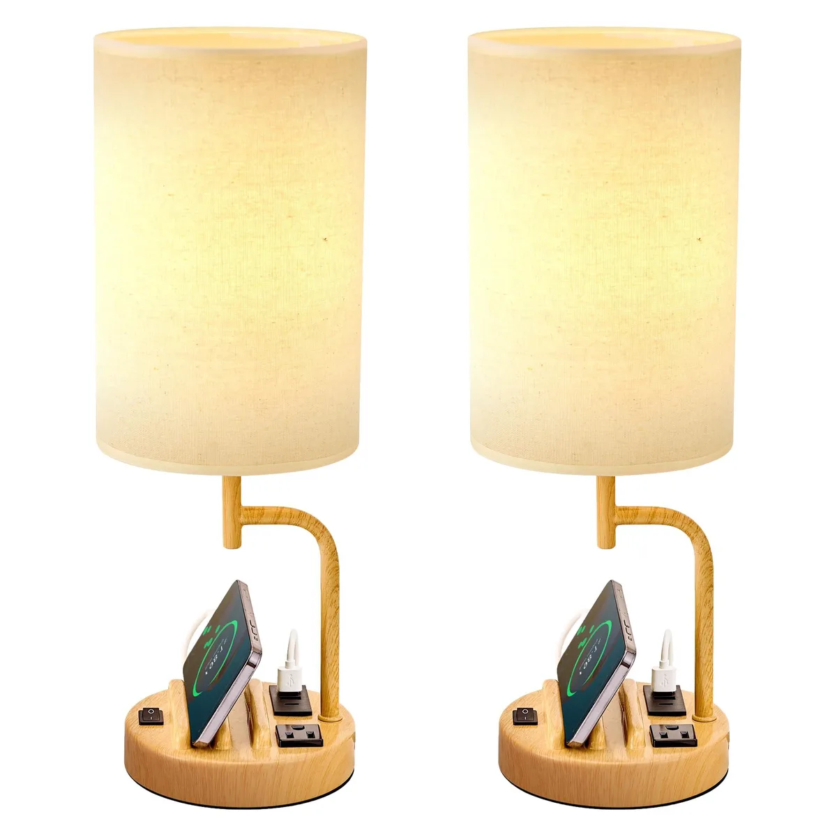 Two modern black metal table lamps with round linen fabric shades and integrated phone holders