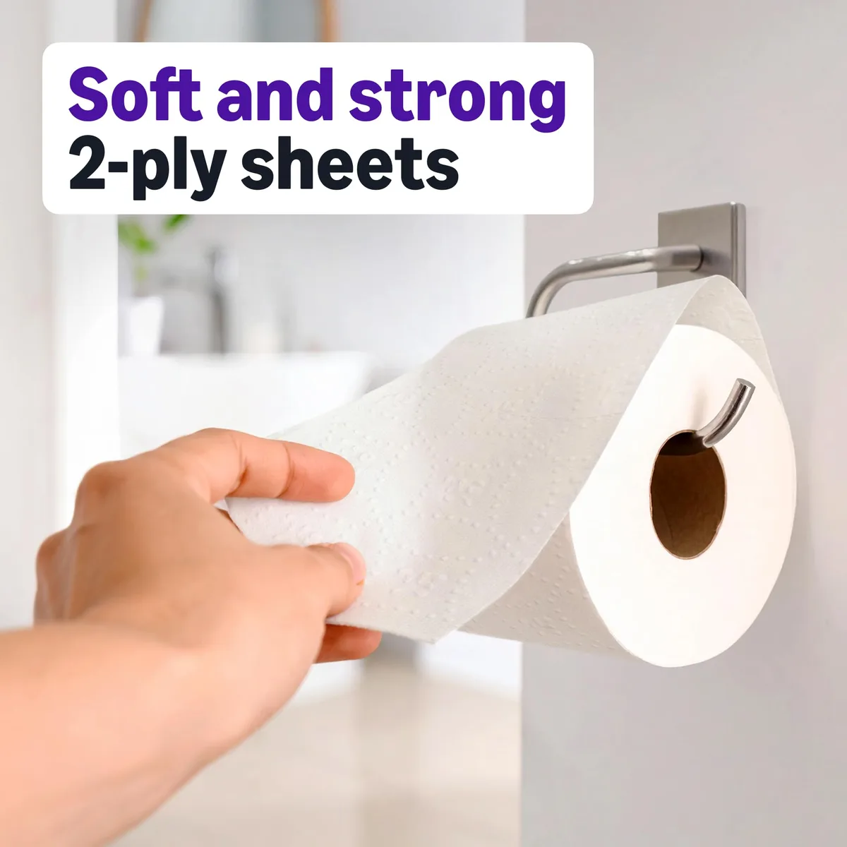 Six rolls of white two-ply toilet paper in plastic wrap