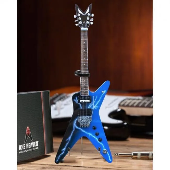 Miniature solid-wood Dean Razorback lightning-bolt replica on adjustable A-frame stand