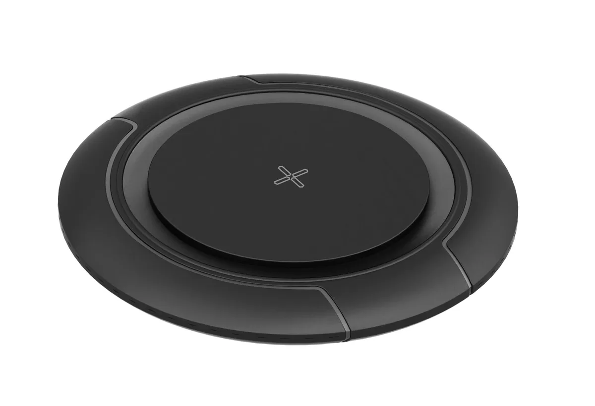 Black circular wireless charging pad with low-brightness indicator light