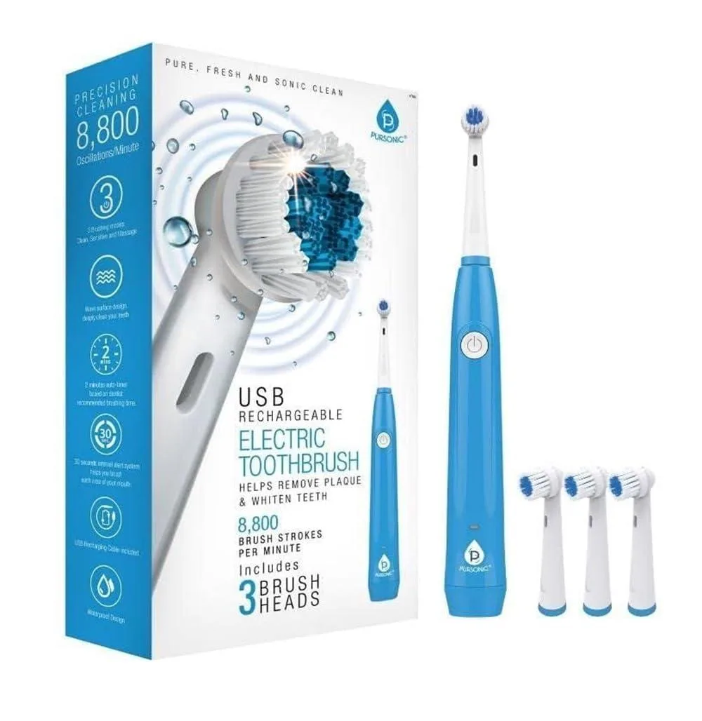 White rotary electric toothbrush handle with round brush head, USB charging base and two spare heads