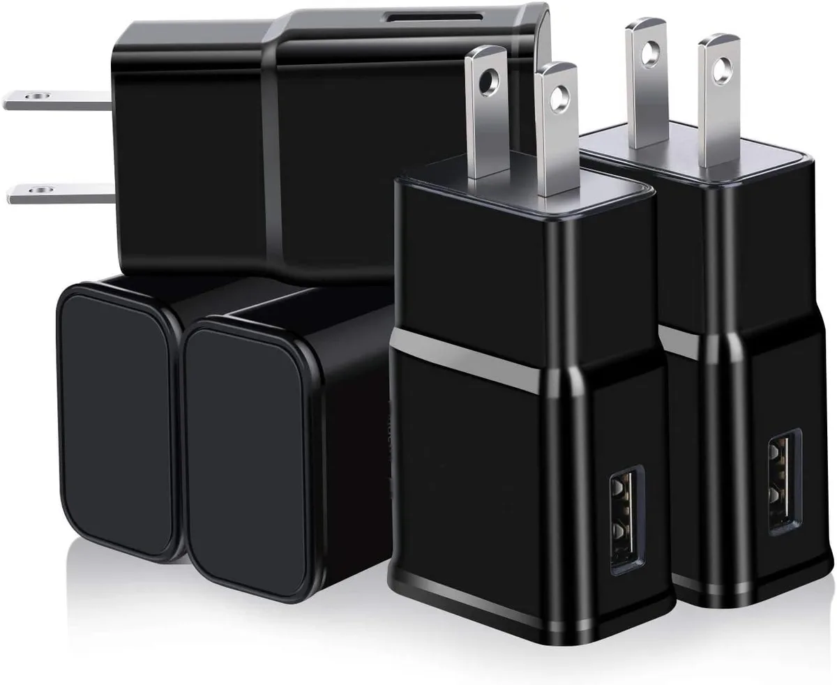Five white USB-C wall chargers with US prongs