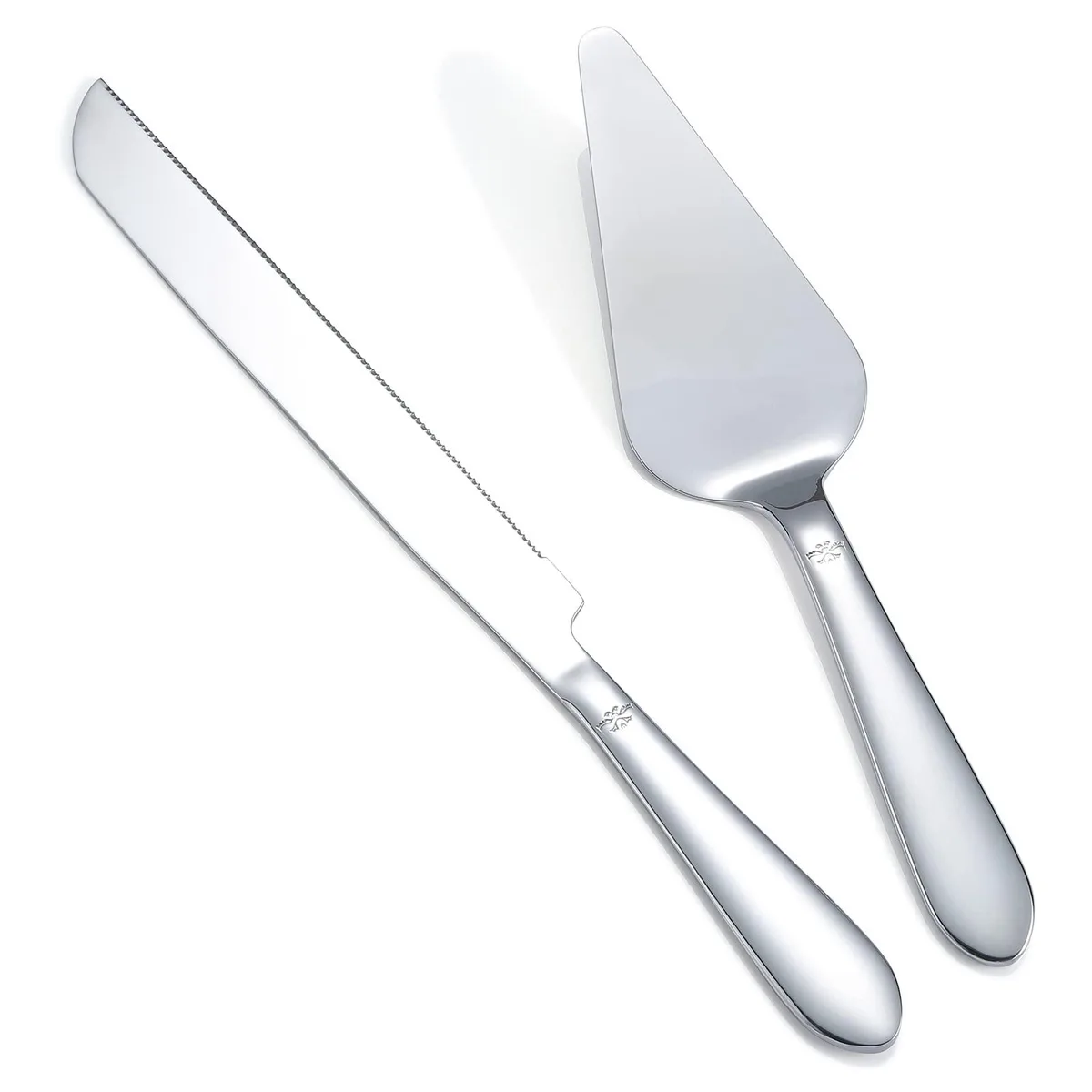 Two stainless steel cake tools with black handles, knife and server, in gift box