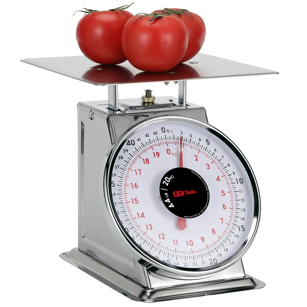 Yellow mechanical kitchen scale with stainless steel platform and angled dial