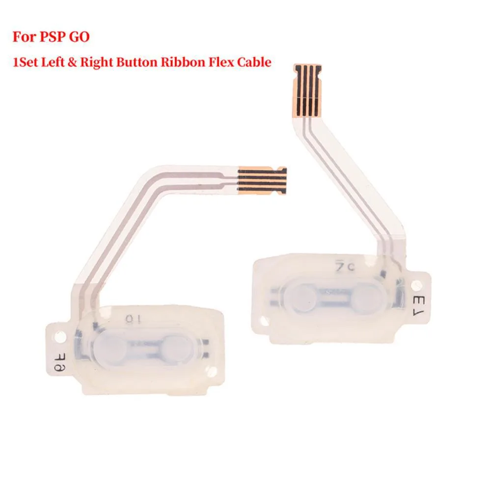 A pair of thin orange ribbon cables with black conductive rubber buttons attached
