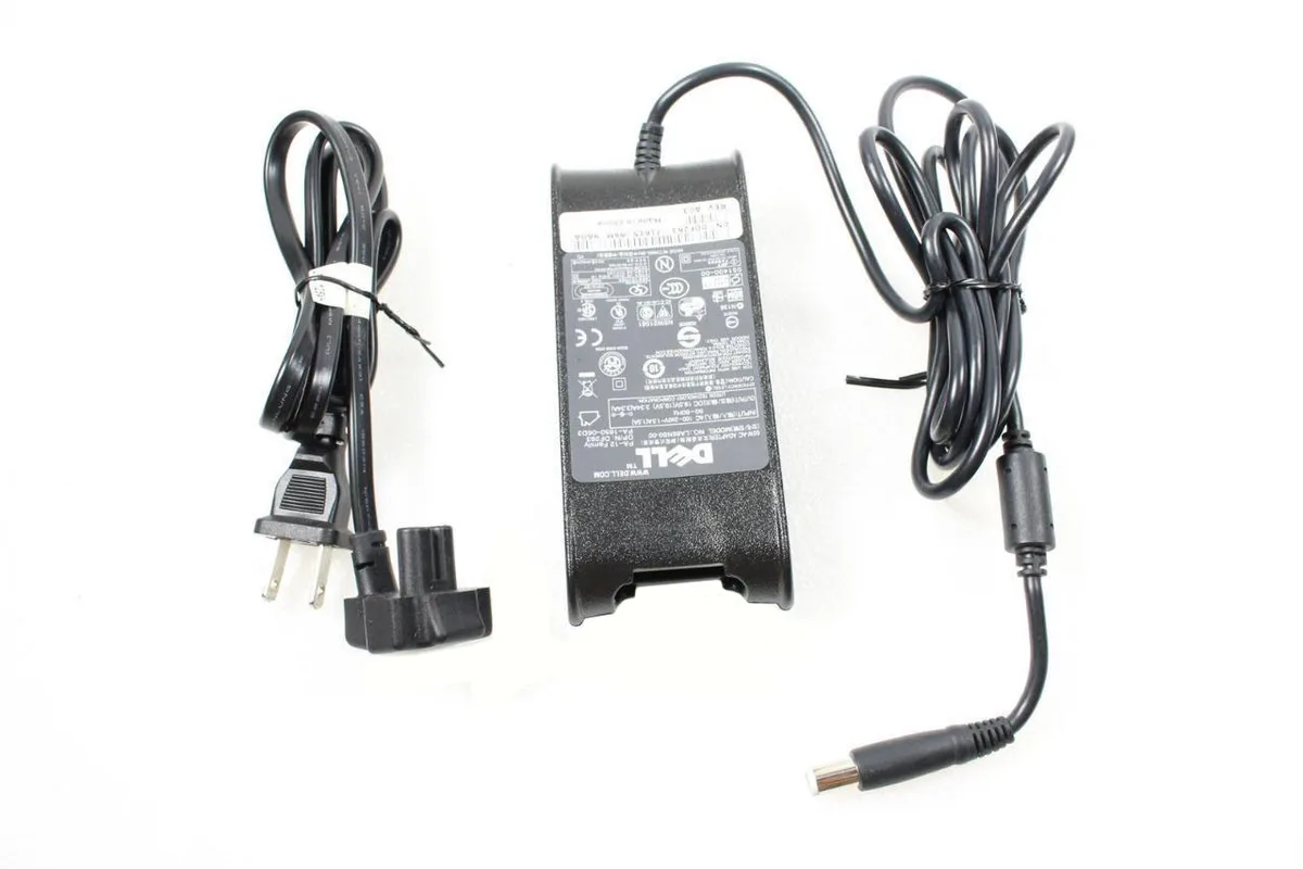 DELL DELL LA65NSO-00 65W laptop AC adapter with power cord — product photo