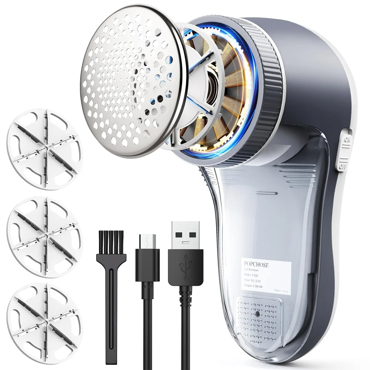 White and grey handheld fabric shaver with honeycomb mesh head and USB-C port