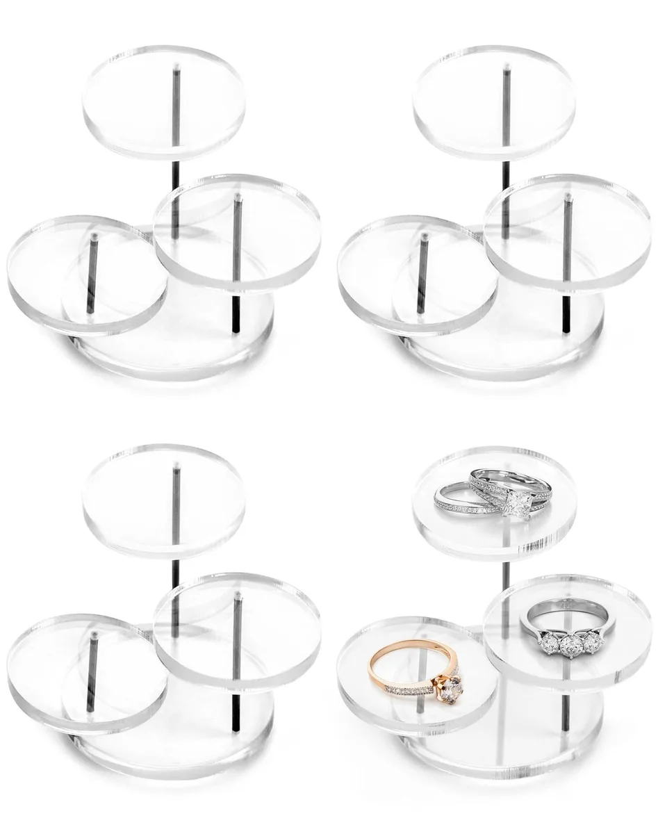 Four clear acrylic three-tier risers with silver metal legs, smallest tray 2.76in diameter