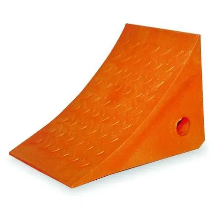 Orange molded urethane wheel chock with grooved tread and molded hole