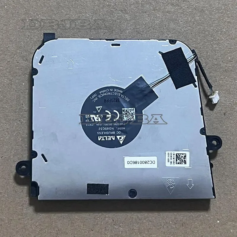 Small black laptop CPU cooling fan with plastic housing and wire connector