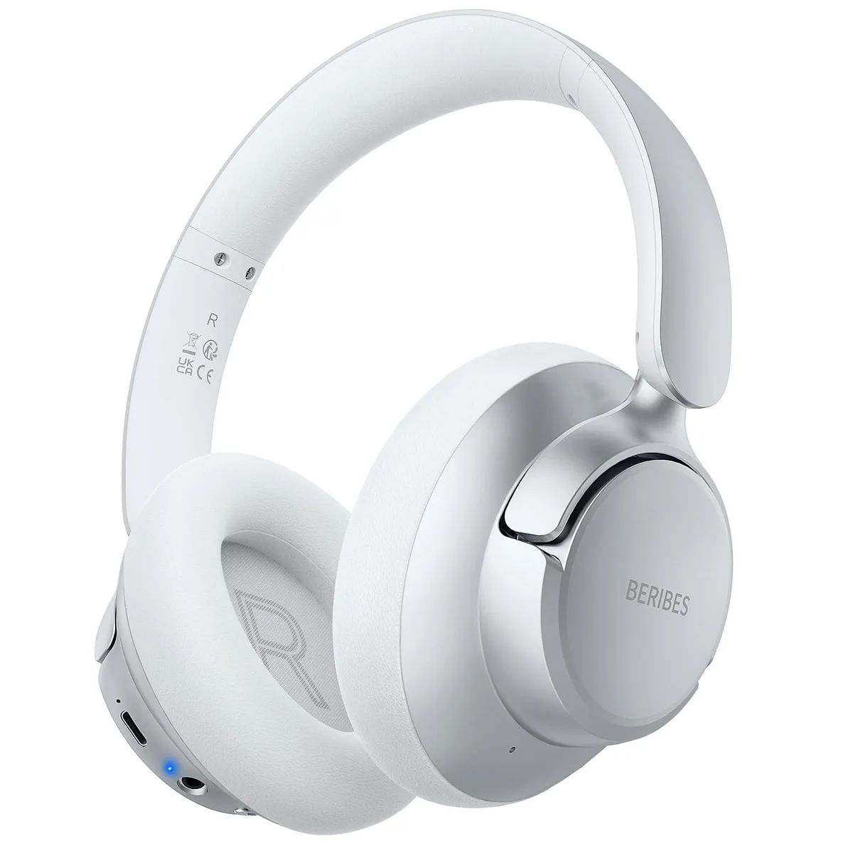 Silver over-ear headphones with padded earcups and headband, folded flat