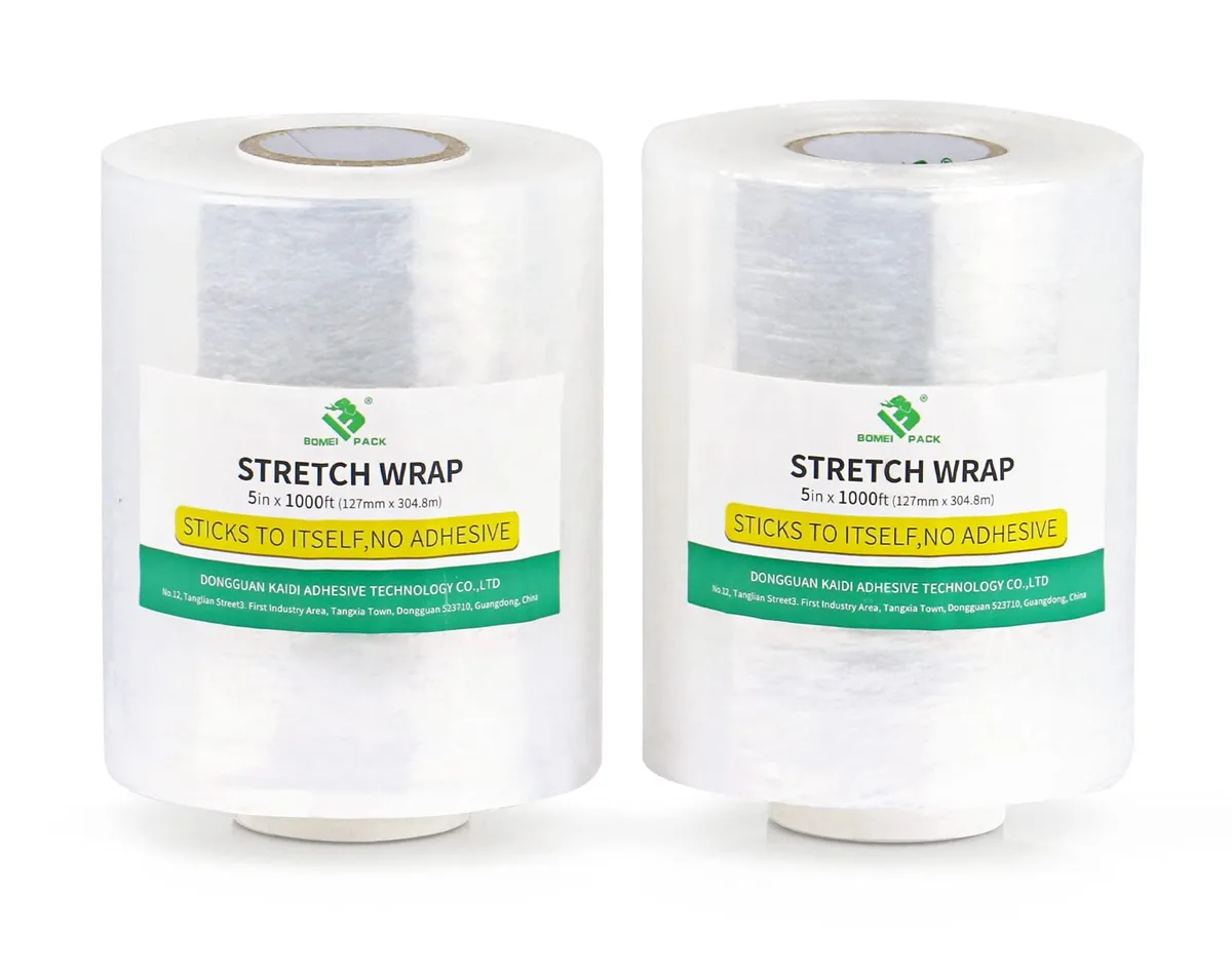 Two clear plastic stretch-wrap rolls on cardboard cores