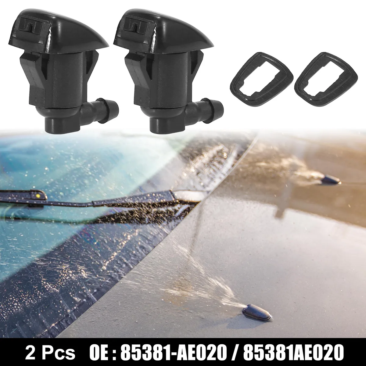 Two small black plastic washer nozzles with gaskets