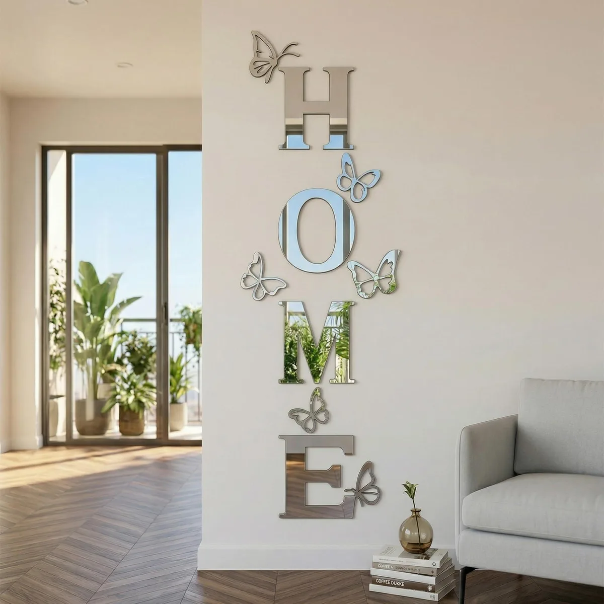 Ten silver acrylic mirror stickers forming HOME letters and butterflies, oblong 59 by 21 inches