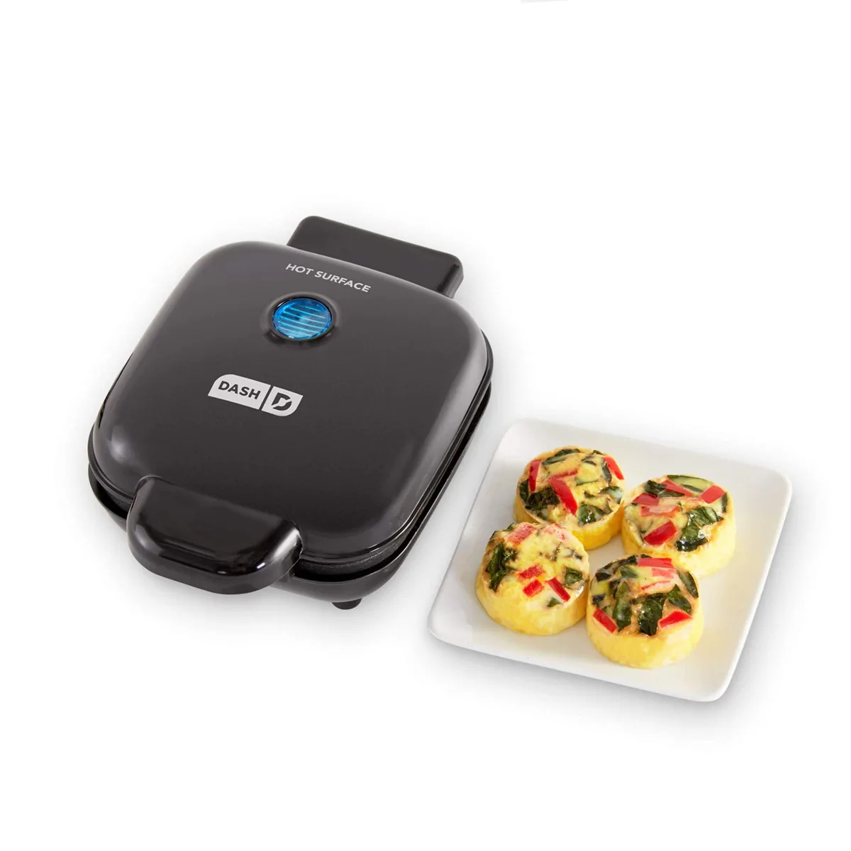 Black compact electric egg bite maker with four silicone cups