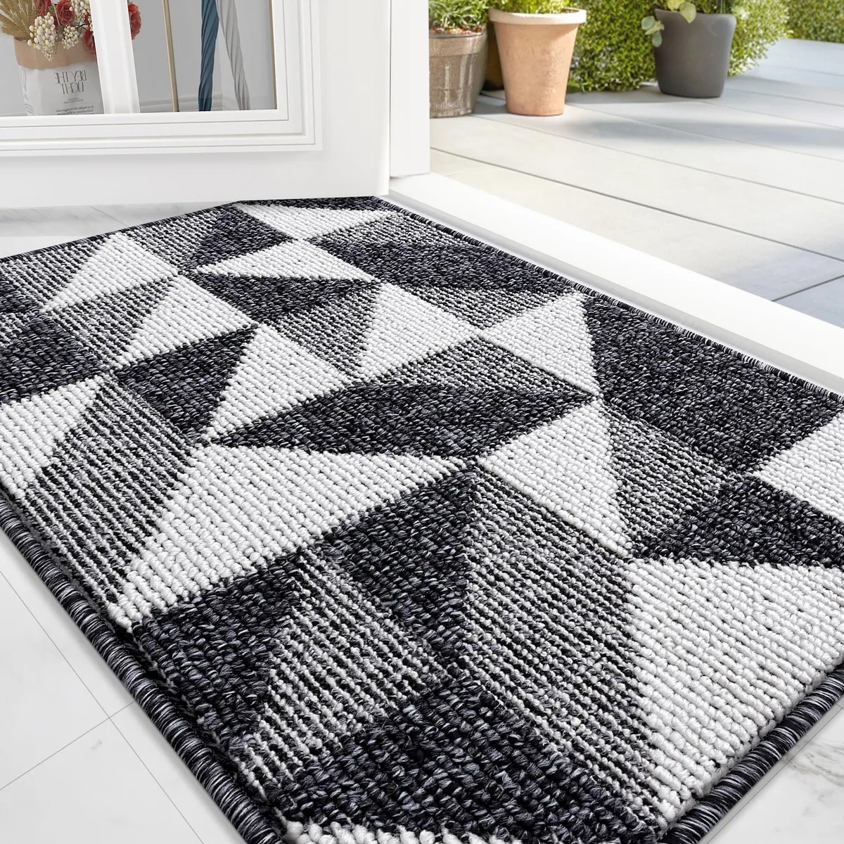 Black striped bamboo door mat, low-profile, 32 by 20 inches