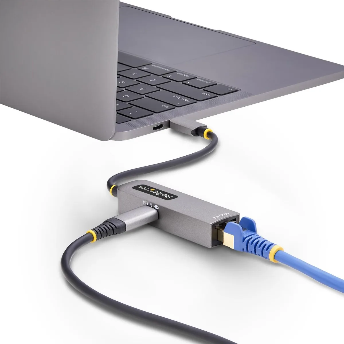 Compact USB-C adapter with short attached cable, RJ45 port and PD pass-through, matte black finish