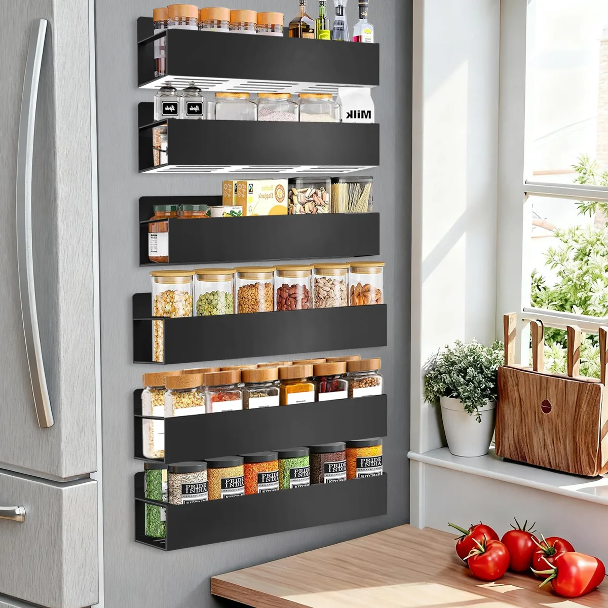 Six red two-tier magnetic spice racks mounted on a fridge