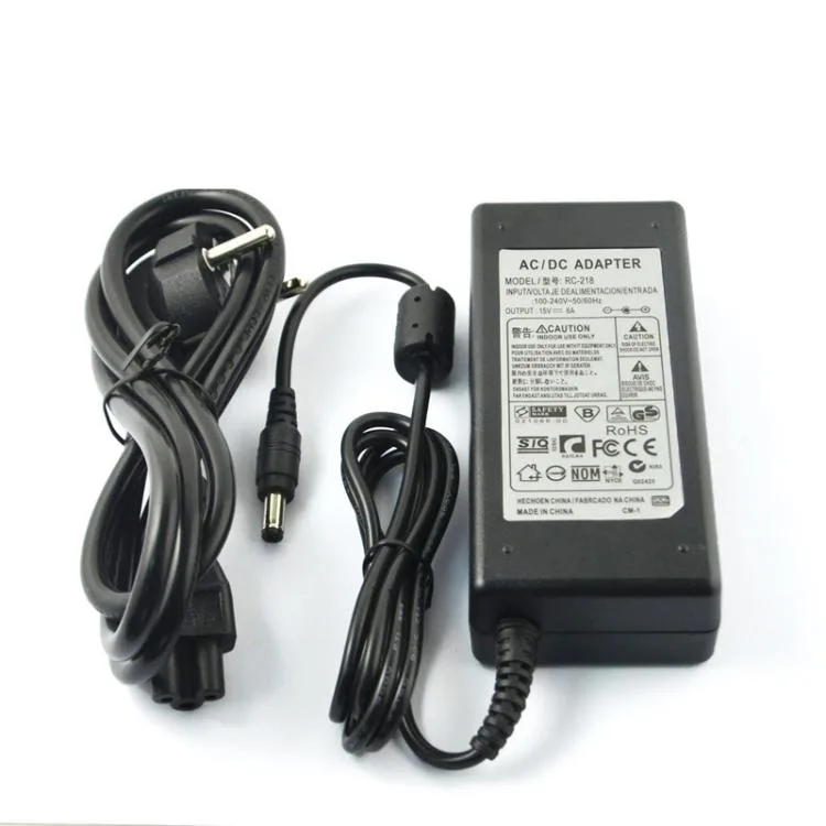 Black rectangular alloy power adapter with EU plug, 1.5 by 2.3 by 6 inches