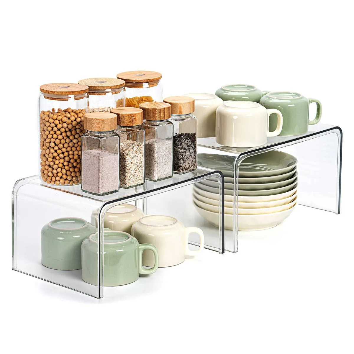 Two clear red plastic tiered shelves, round shape, set of two