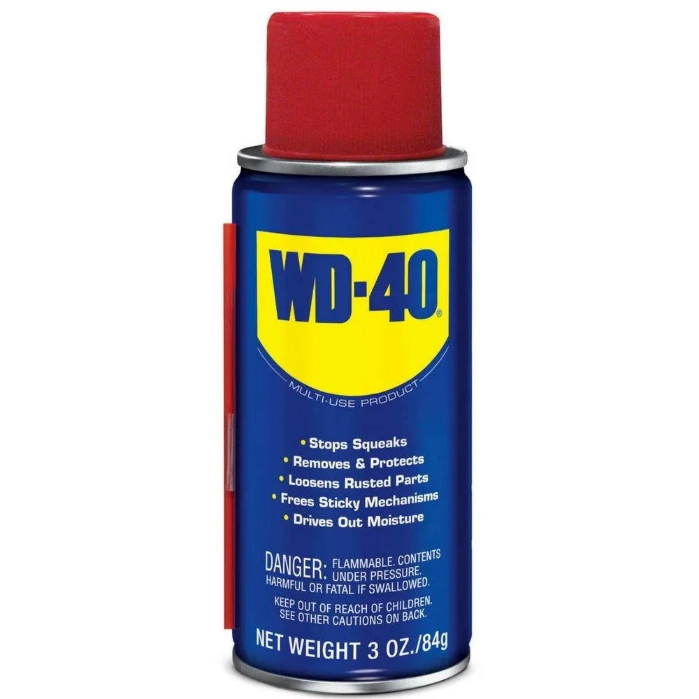 Small blue and yellow aerosol can with red cap