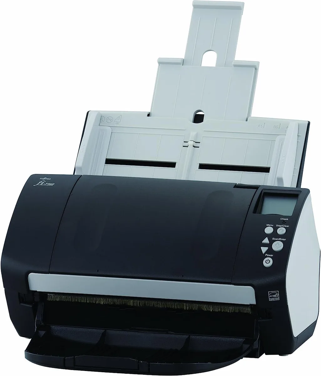 Rectangular desktop document scanner in dark grey plastic with top-mounted ADF tray