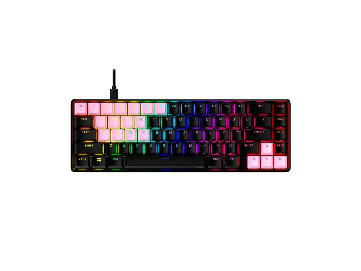 Pink rubber keycap set in US layout on a flat surface