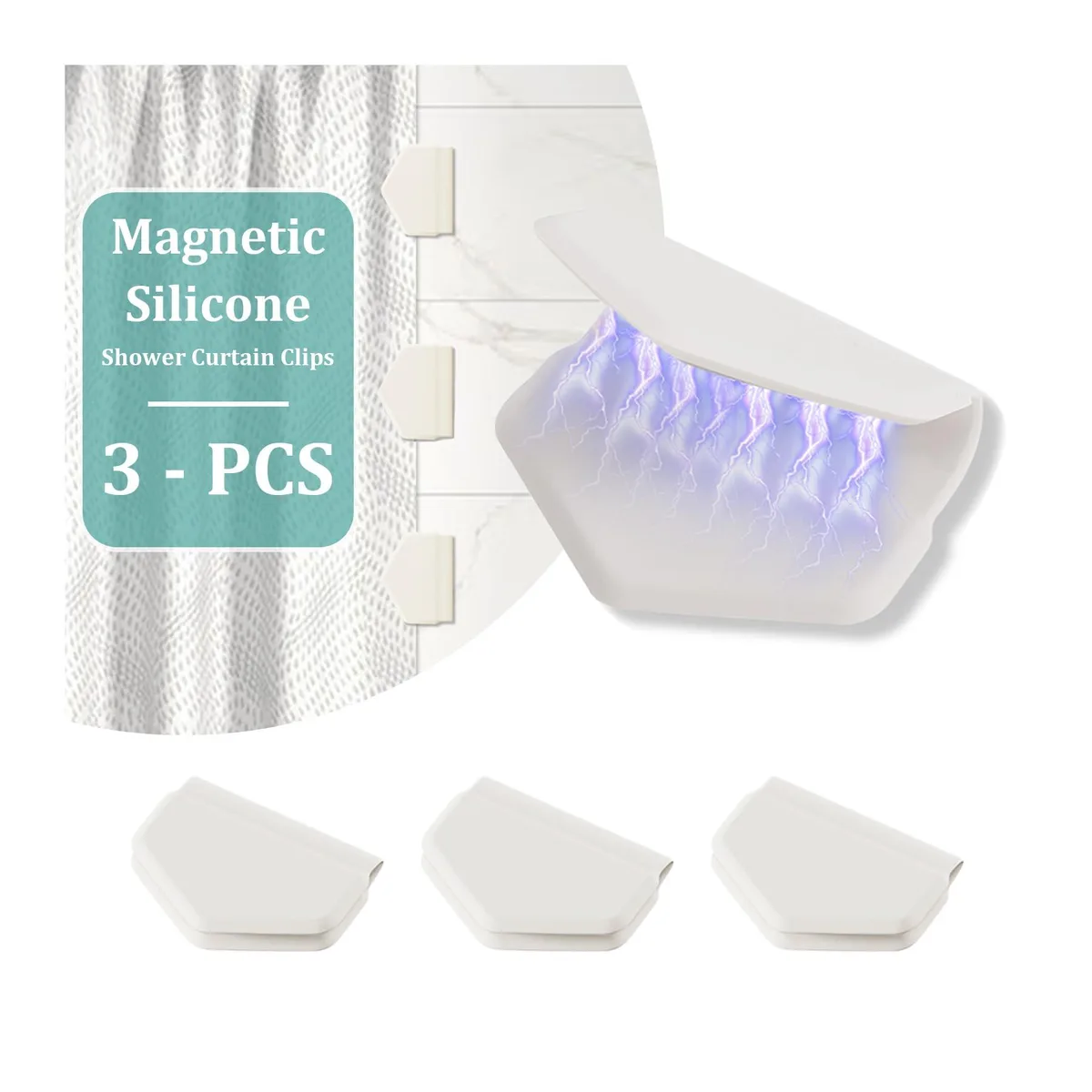 Three white silicone magnetic clips on a surface