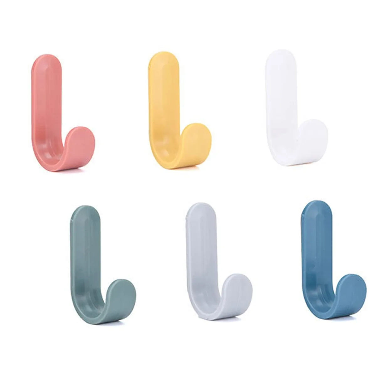 Six small multicolour plastic wall hooks with adhesive backs
