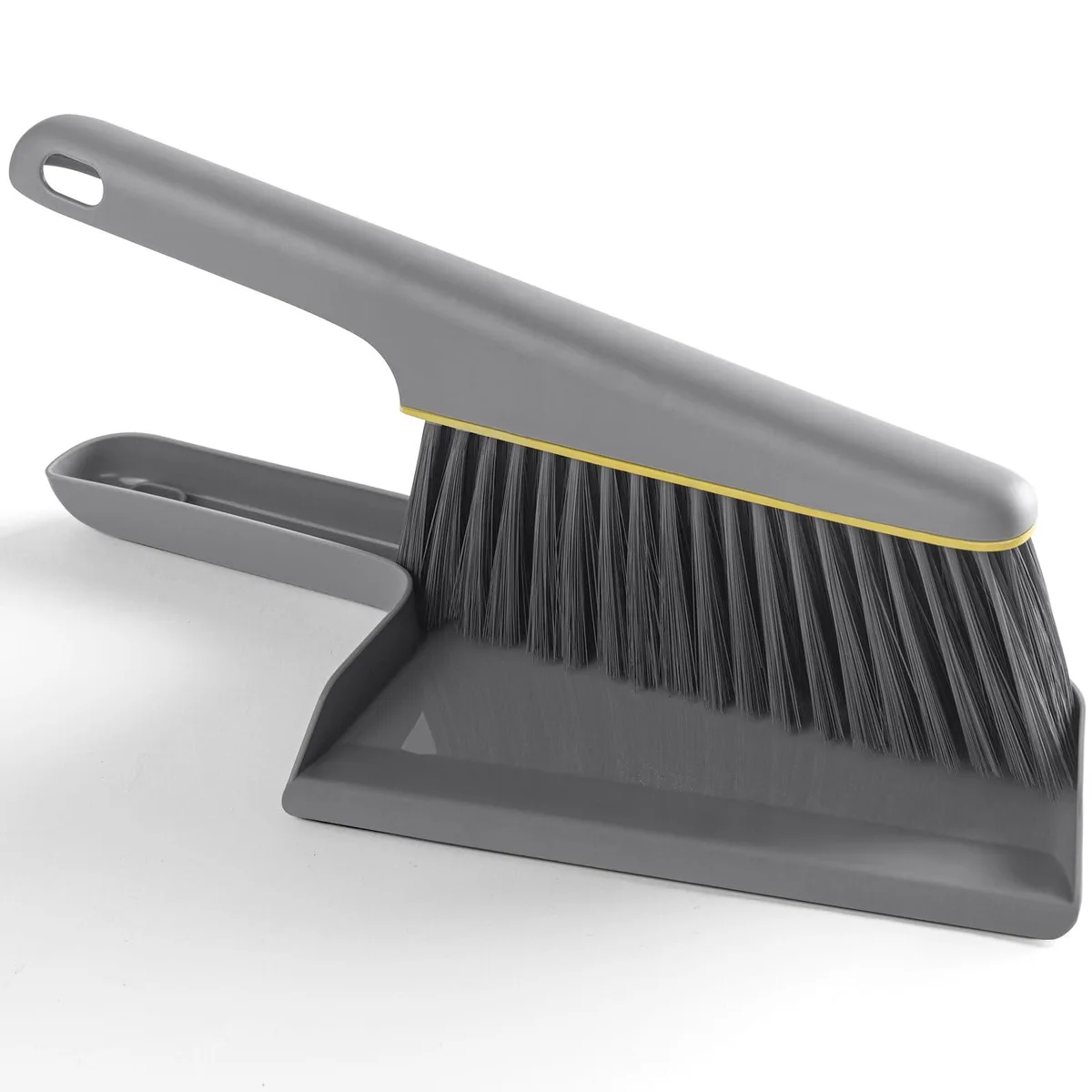 Gray handheld broom and dustpan set, compact snap-together design, dense bristles