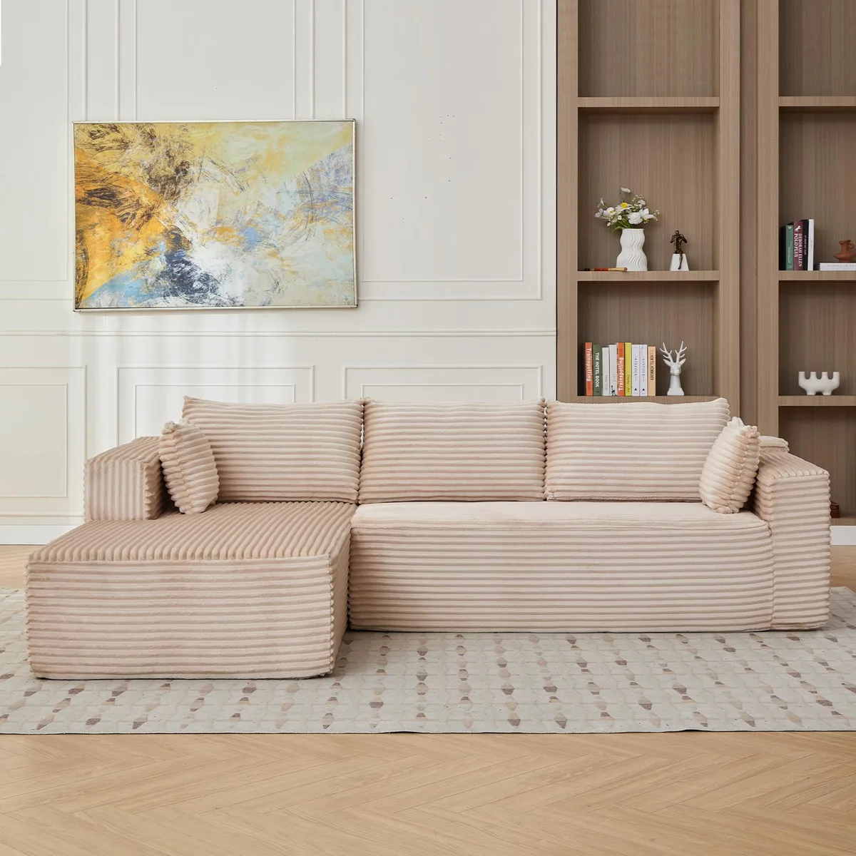Beige corduroy L‑shaped sectional with chaise