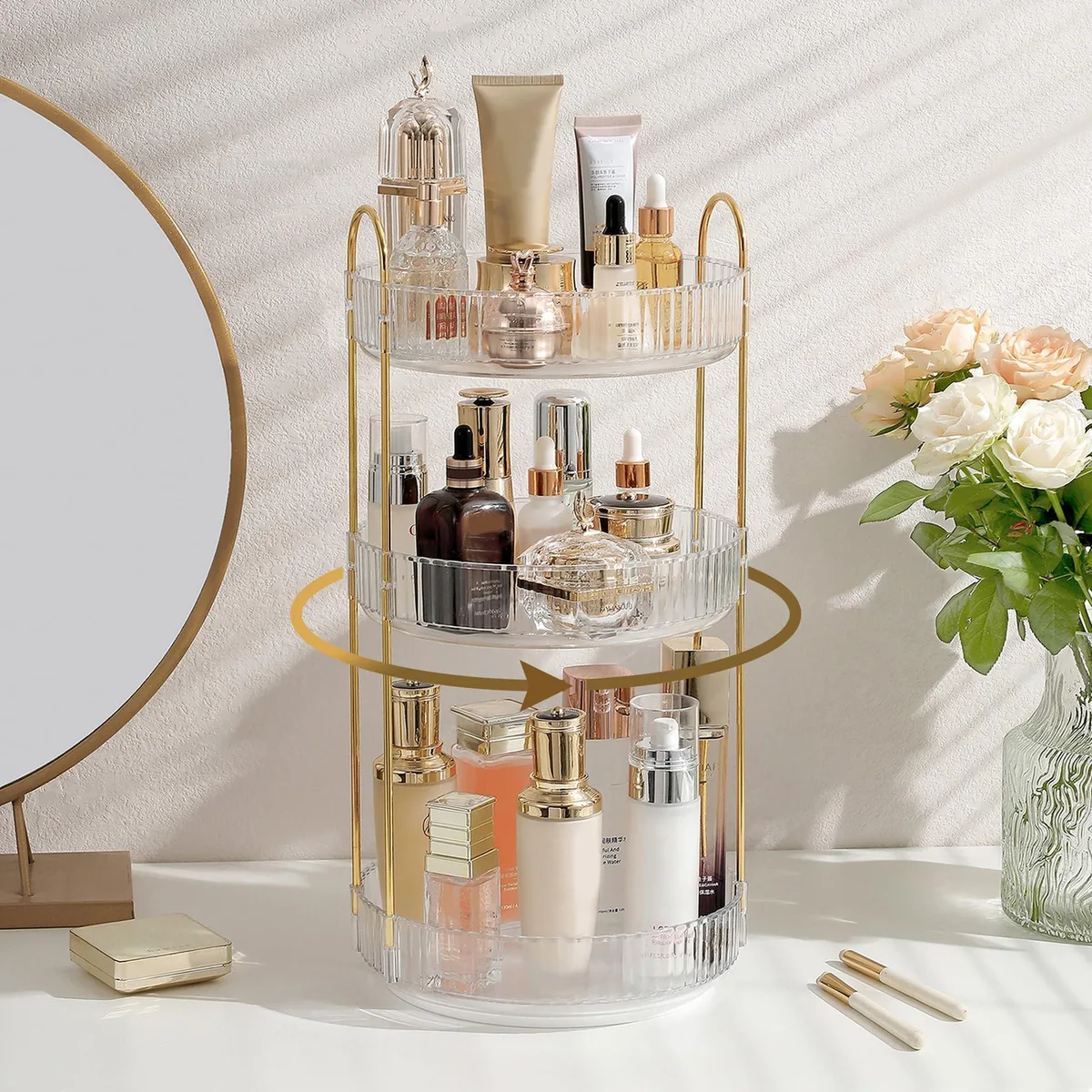 White three-tier rotating bath storage unit with clear trays on a metal pole, 14.33in wide