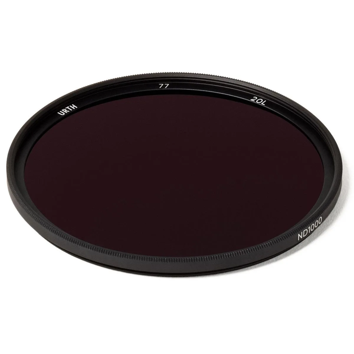 A slim black 77mm circular filter with dark neutral glass and silver threading