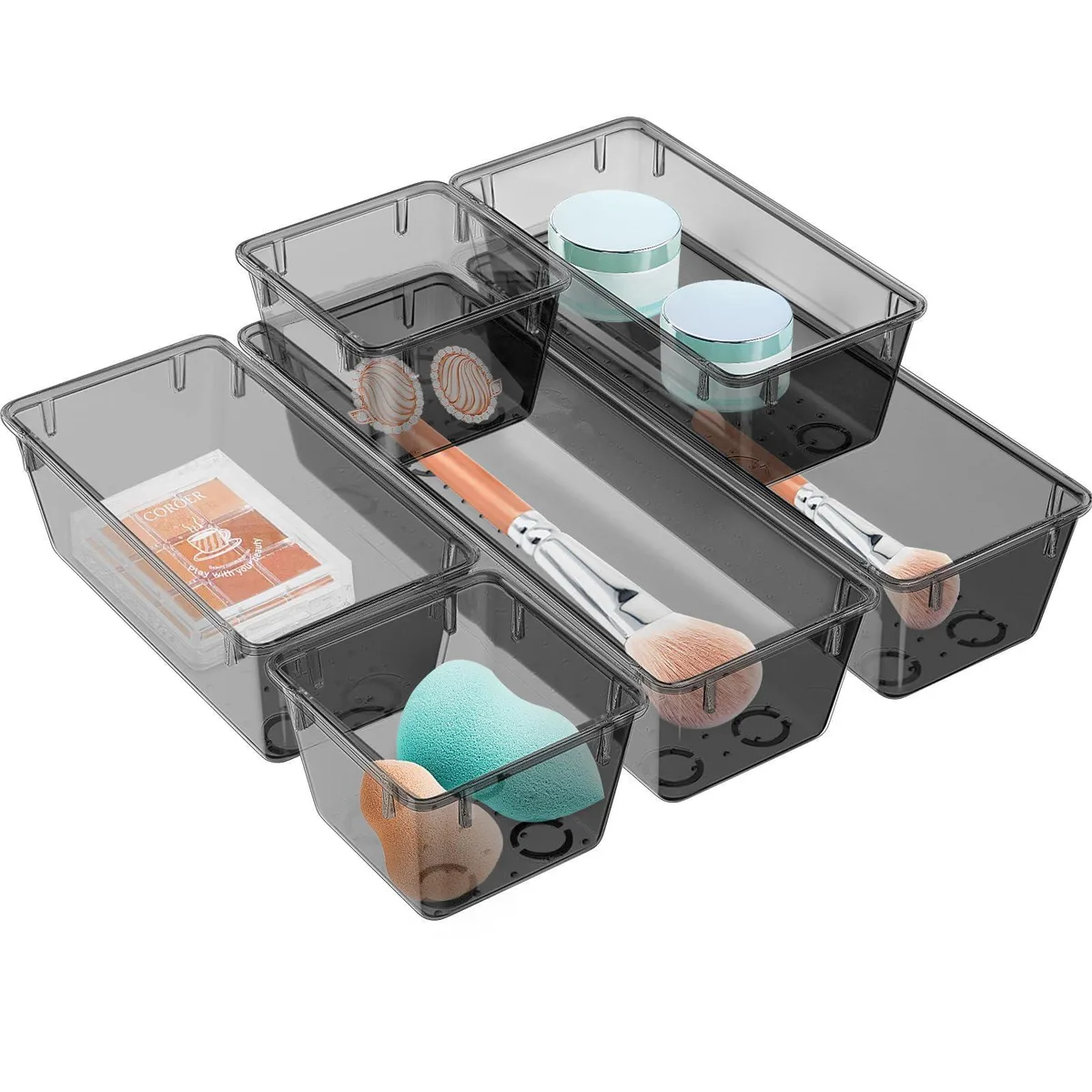 Six clear acrylic drawer trays in three rectangular sizes, glossy finish, stackable with non-slip bases