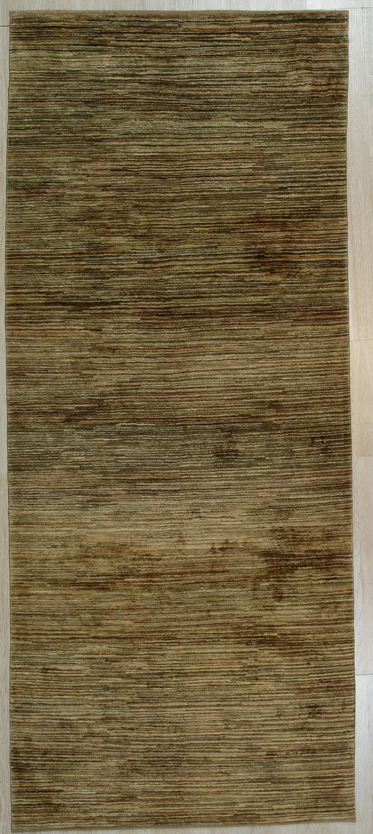 Handmade Afghan wool rug in gold with traditional allover pattern