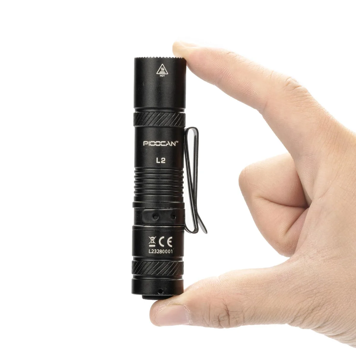 Small black aluminium flashlight with pocket clip