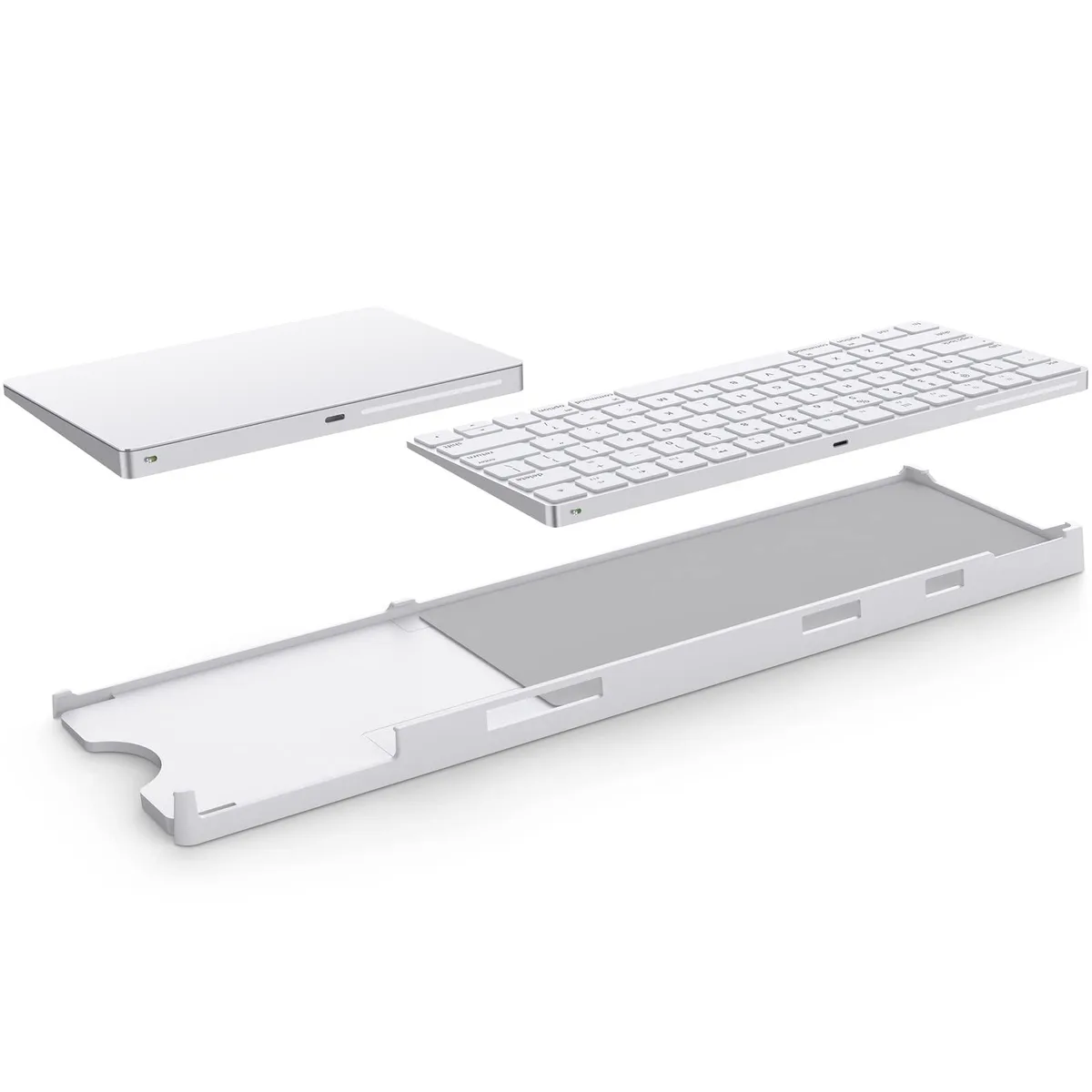 White plastic stand holding Apple Magic Keyboard and Trackpad side by side