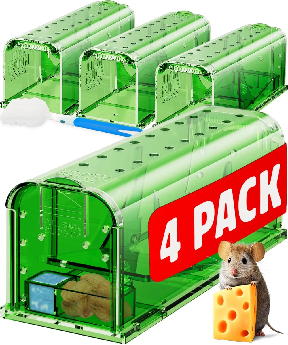 Four green plastic live-catch mouse traps with air holes