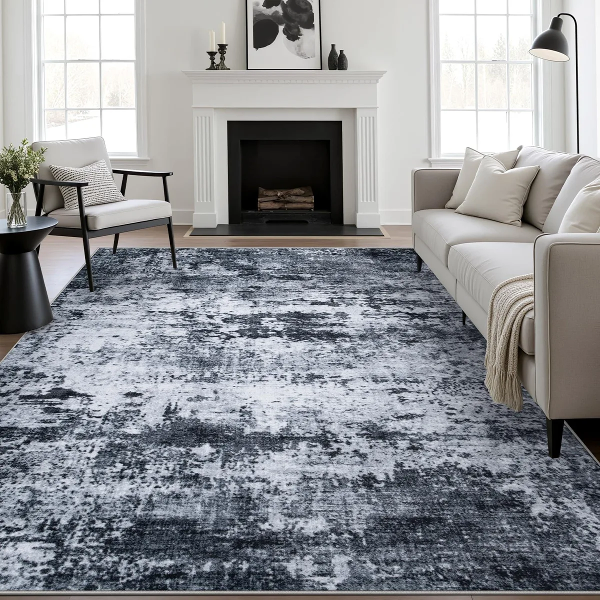 Rectangular black polyester rug with low pile and non-slip backing