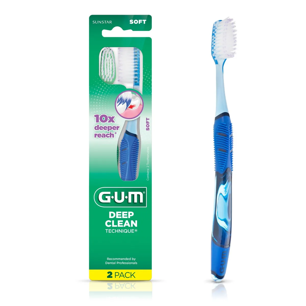 Two soft-bristle toothbrushes with full compact heads and ergonomic quad-grip handles