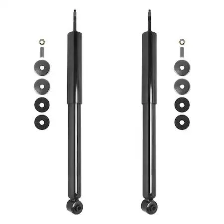 Two silver rear shock absorbers in a kit box
