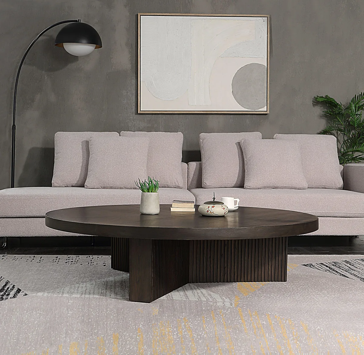 Round coffee table in dark espresso finish, synthetic wood construction