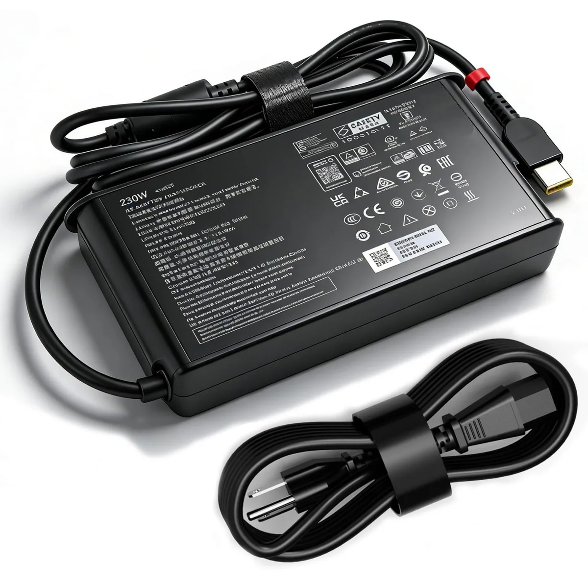 Black rectangular 85W Dell AC adapter with yellow slim tip connector and corded electric plug