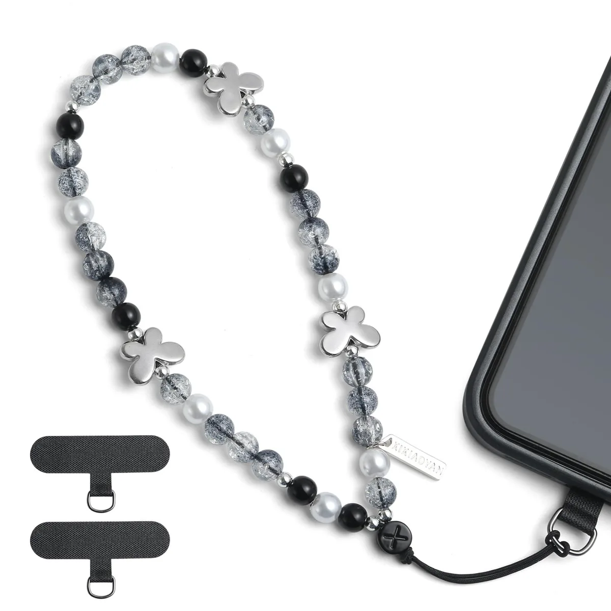 White beaded phone charm with three butterfly accents and a bow detail, 6.2-inch length