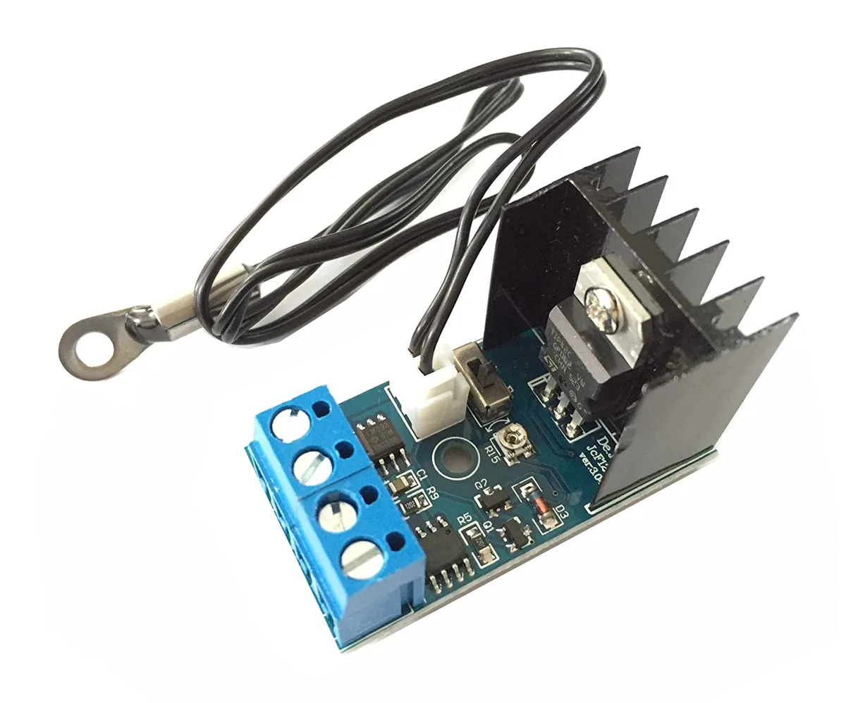 Small rectangular green circuit board with a silver temperature probe wire attached