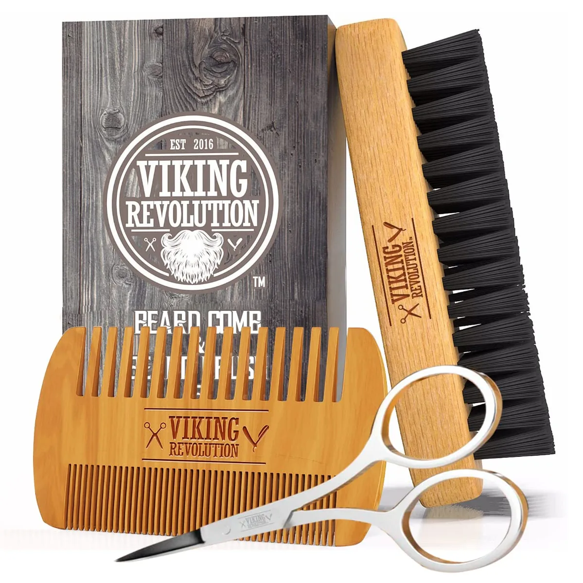 A beard comb and brush set in a velvet travel pouch