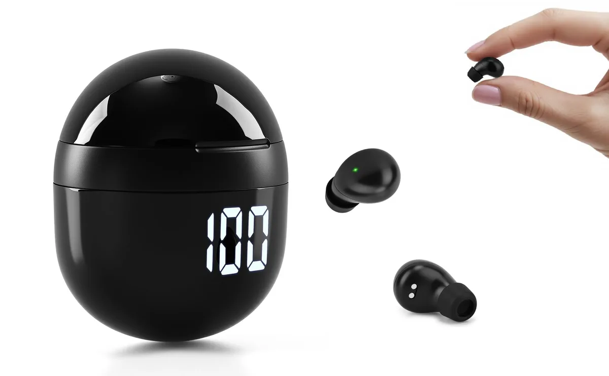 Tiny black in-ear buds in a rounded tumbler charging case