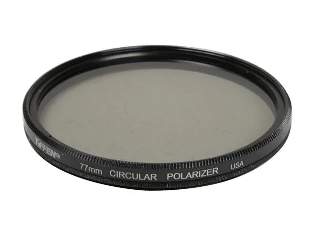 A thin circular glass filter in a black metal frame, 77mm diameter
