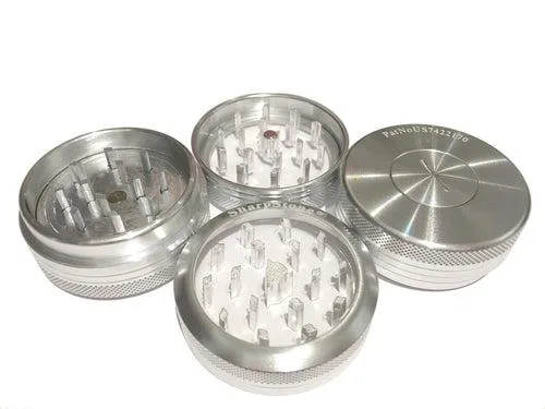 Small silver aluminium shredder with clear top and push-up base